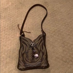 Small upcycled Nocona boot fashion purse.